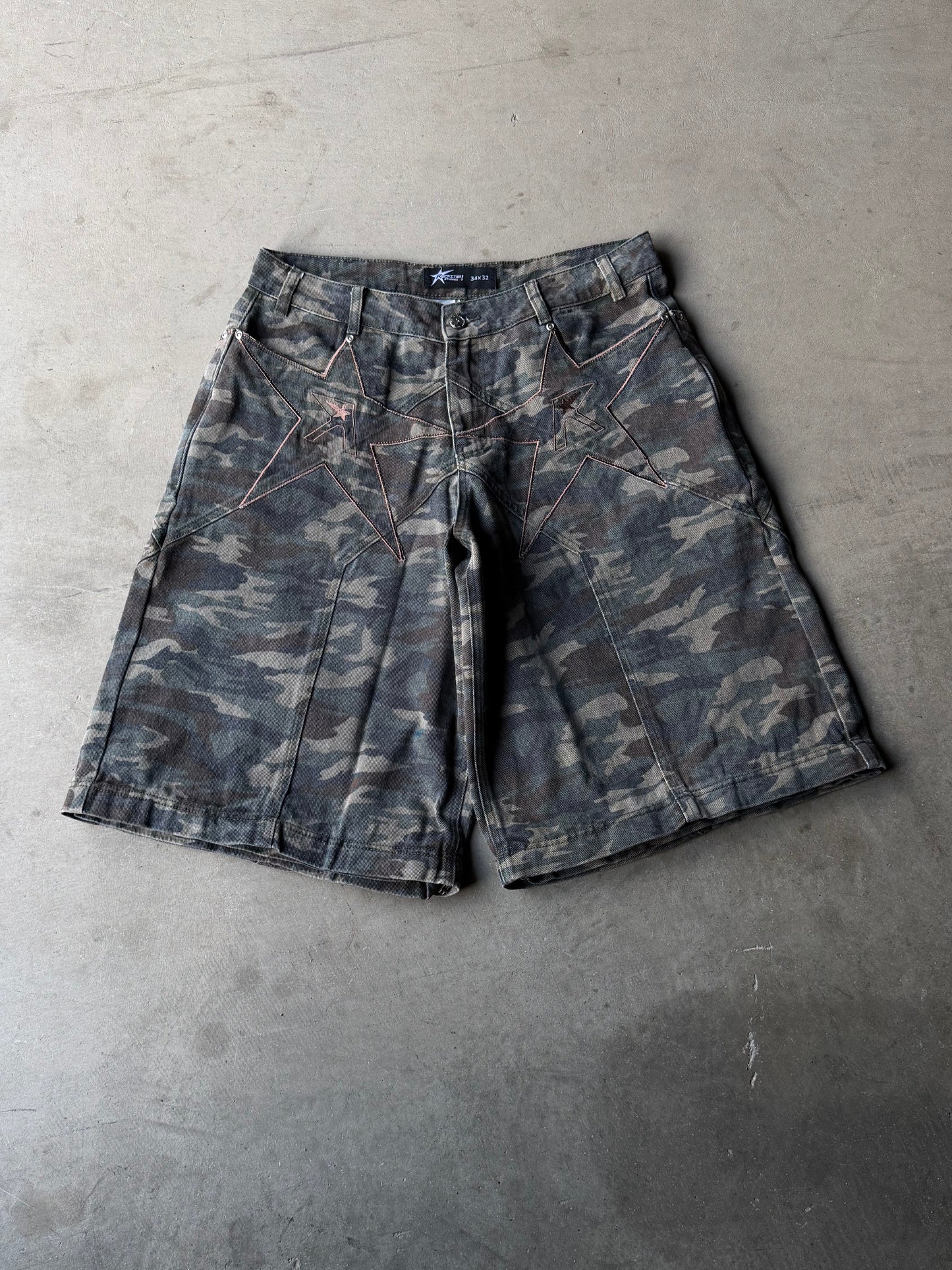 Darkwash camo logo pocket convertible jeans