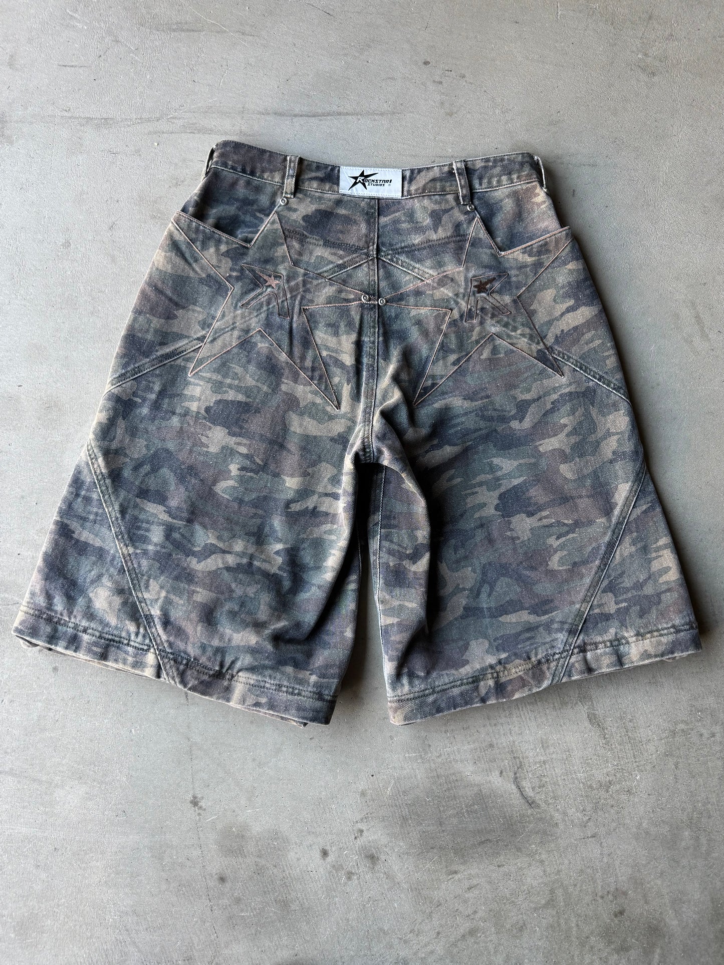 Camo logo pocket convertible jeans